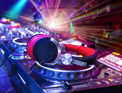 Image of DJ headphone on top of CDJs